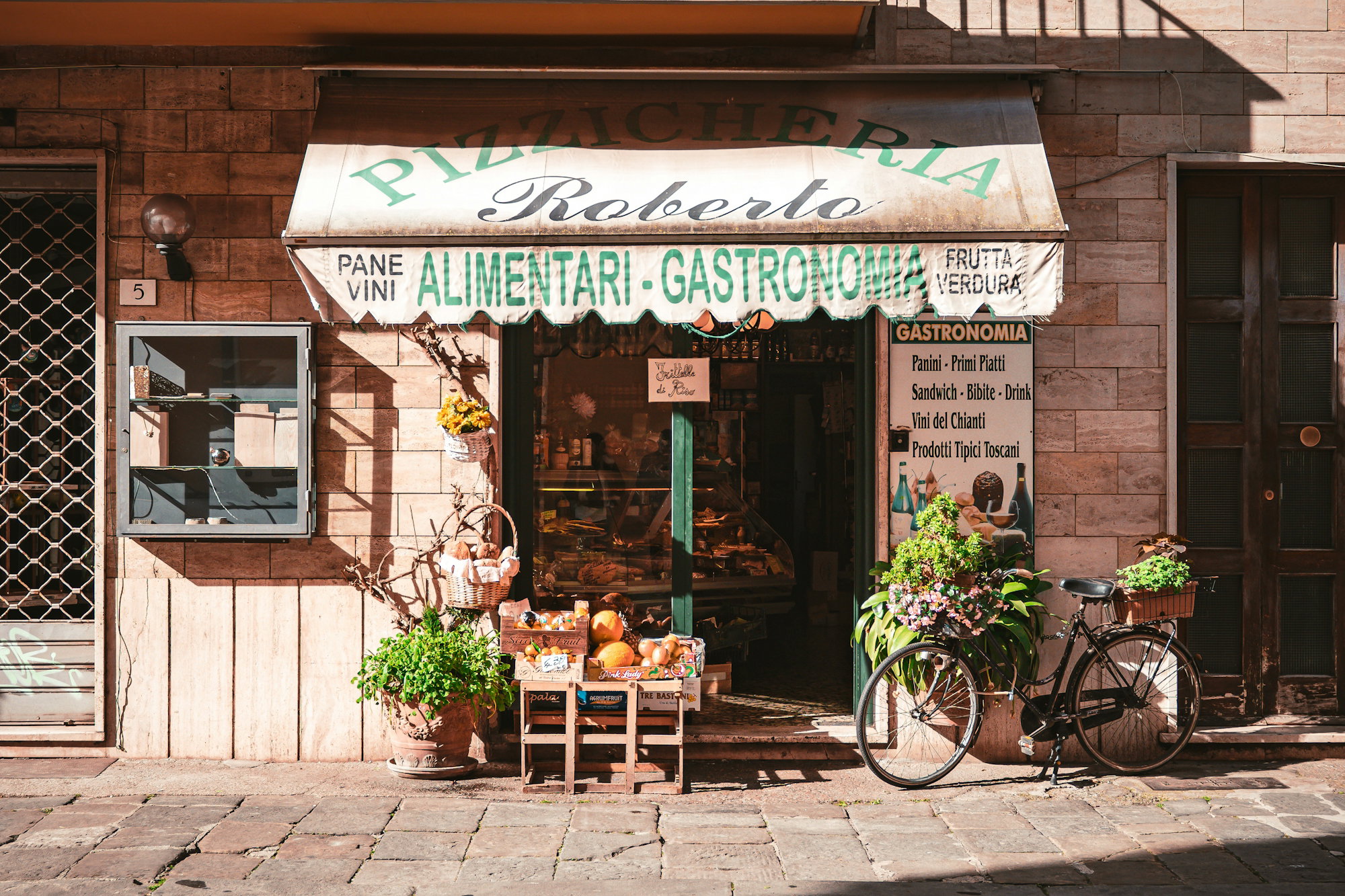 a bicycle is parked outside of a store